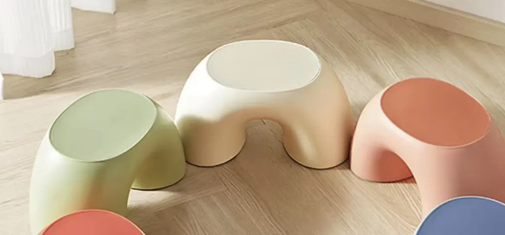ARCA stools in several colours on a bathroom floor
